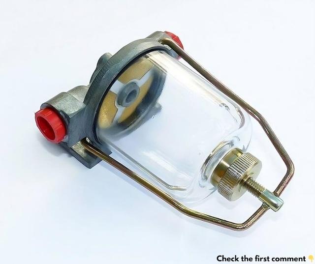 A pristine example of a classic car AC Delco-type fuel & water trap glass bowl filter, showing off its vintage design that was a must-have for car enthusiasts of yesteryear