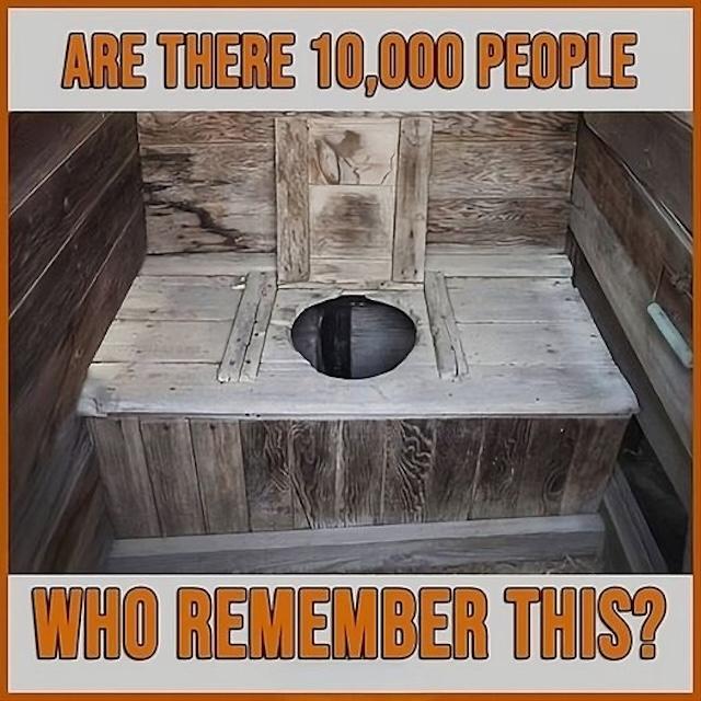 An old wooden pit toilet, a relic of simpler times when outdoor sanitation was the norm for many rural households